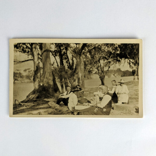 Snapshot Photograph of a Party on a Riverbank