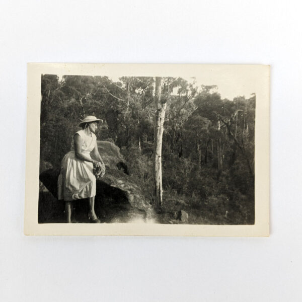 Snapshot Photograph of a Woman Petting her Cat in the Bush